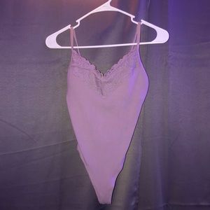 Purple body suit from pink